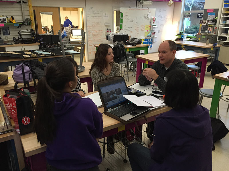 Philip working with students at Inglemoor High School